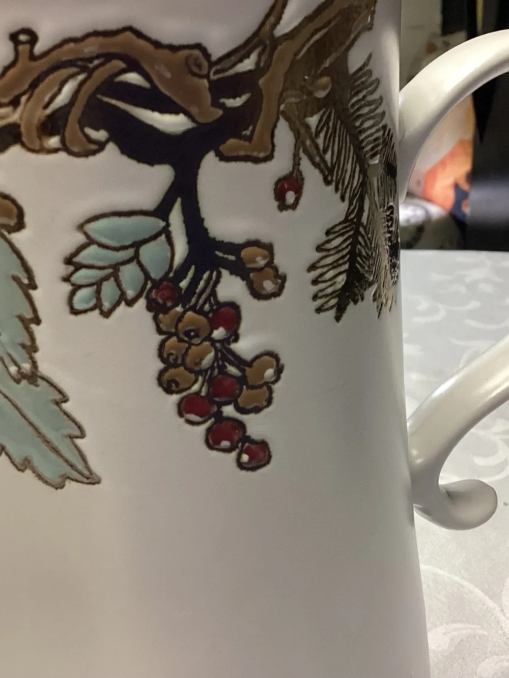 FAll themed pitcher tall cylindrical shape. Gold details too